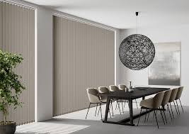 Office blinds Dubai installed in corporate workspace with wall to wall carpet Dubai and modern office interior.